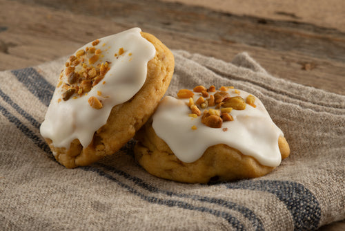 Our handcrafted, gourmet Royal Coronation cookie featuring a Mascarpone cheese icing, pistachios, and hints of orange and cinnamon flavors.
