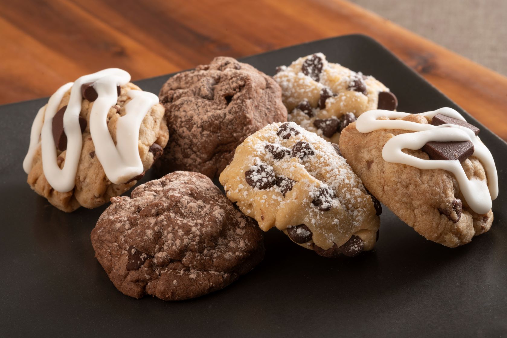 A platter of our gourmet Chocolate Chip, Caramel Rock, and Chocolate Brownie Grenade.
