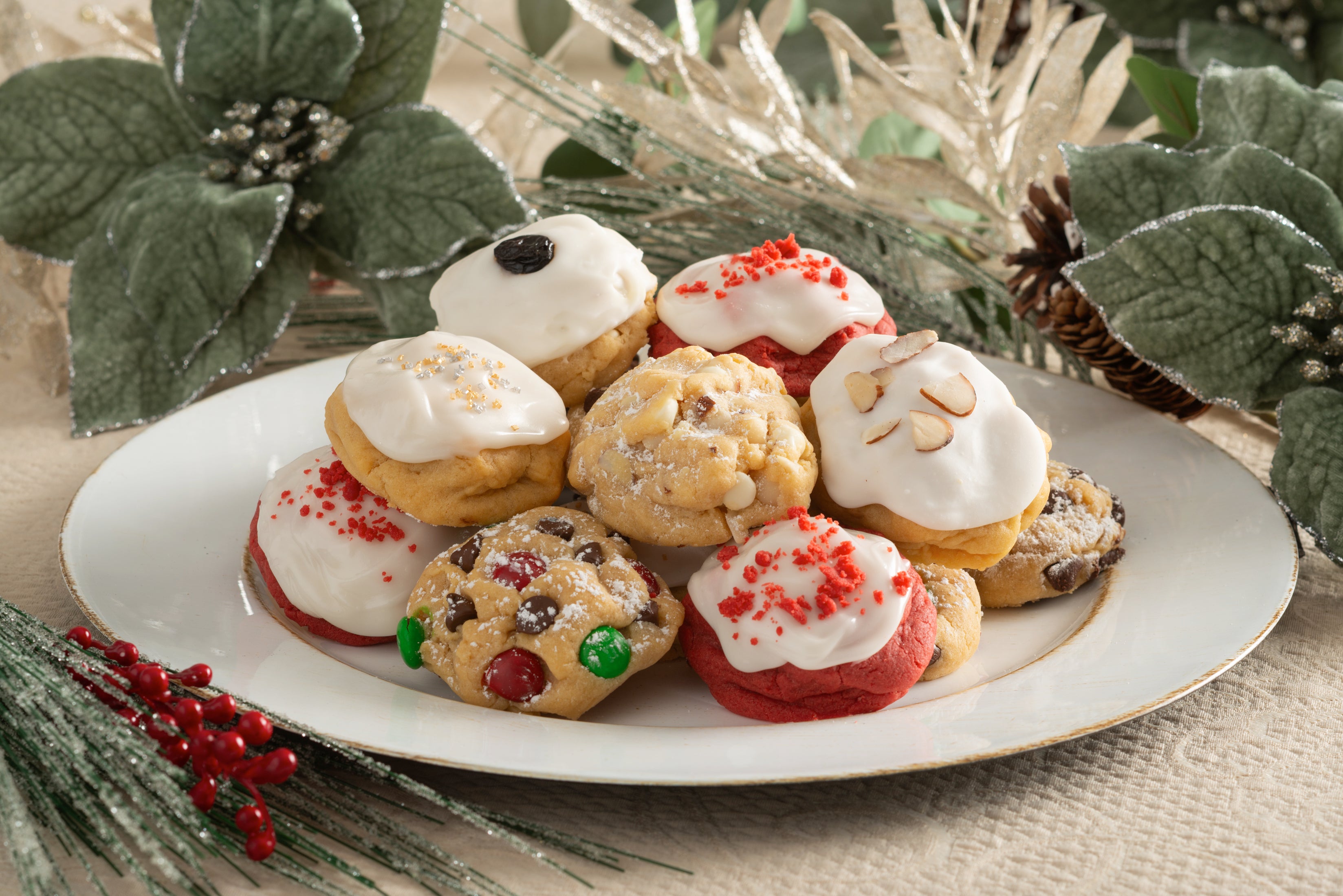 Holiday cookies stacked up on a holiday platter.
