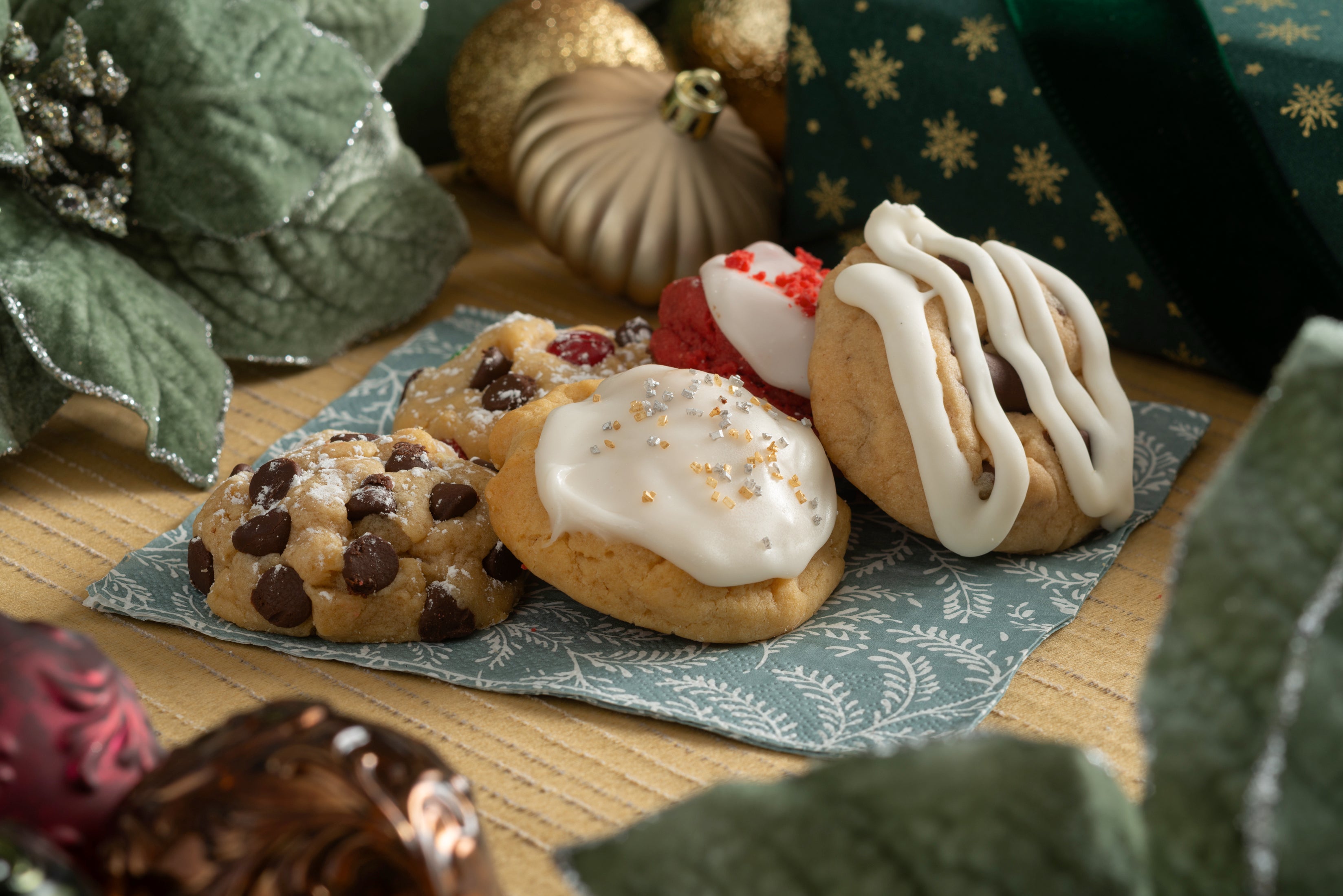 Holiday cookie flavors: iced sugar gems, red velvet, oatmeal chocolate chip, and candied chocolate chip.