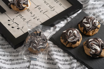Poetry cookies on a music note platter.