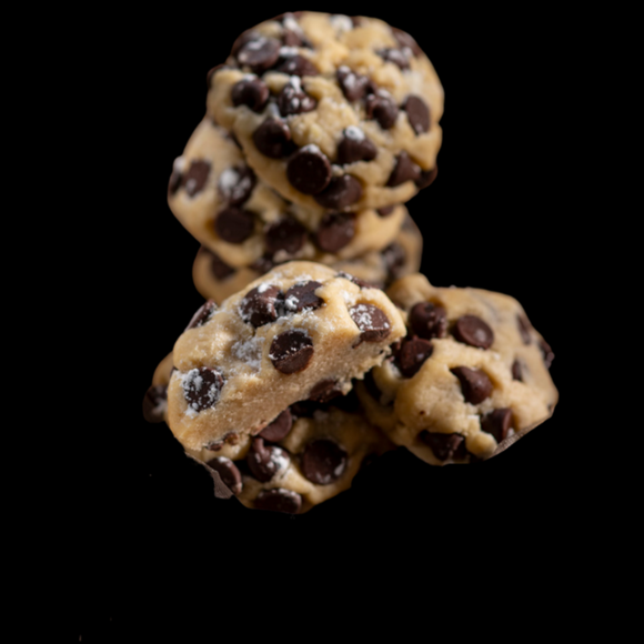 A stack of gourmet chocolate chip cookies.