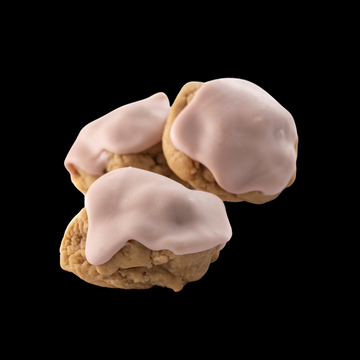 Our gourmet Gluten-Free Iced Raspberry cookie with raspberry dough, and raspberry icing.