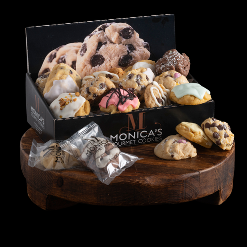 A gourmet cookie box filled to the top with our Iced Almond, Caramel Rock, Iced Keylime, Brownie Grenade, and Naughty Almond cookies.