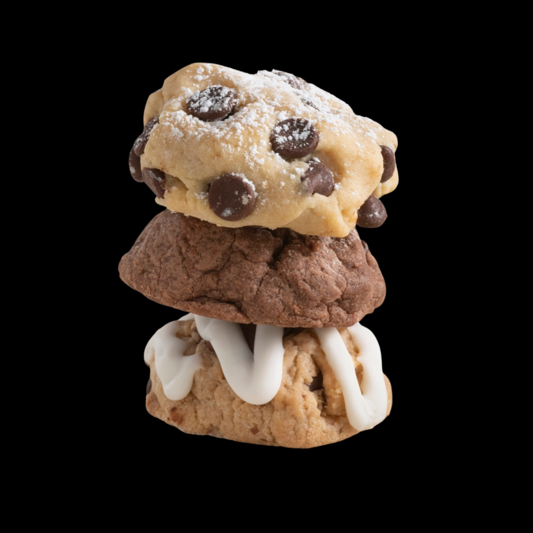 A delicious stack of cookies, featuring our Chocolate Chip, Chocolate Brownie Grenade, and Caramel Rock.