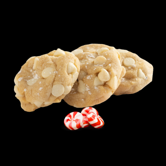 Our White Chocolate Peppermint cookie with peppermint emulsion and white chocolate chips, topped with powdered sugar.