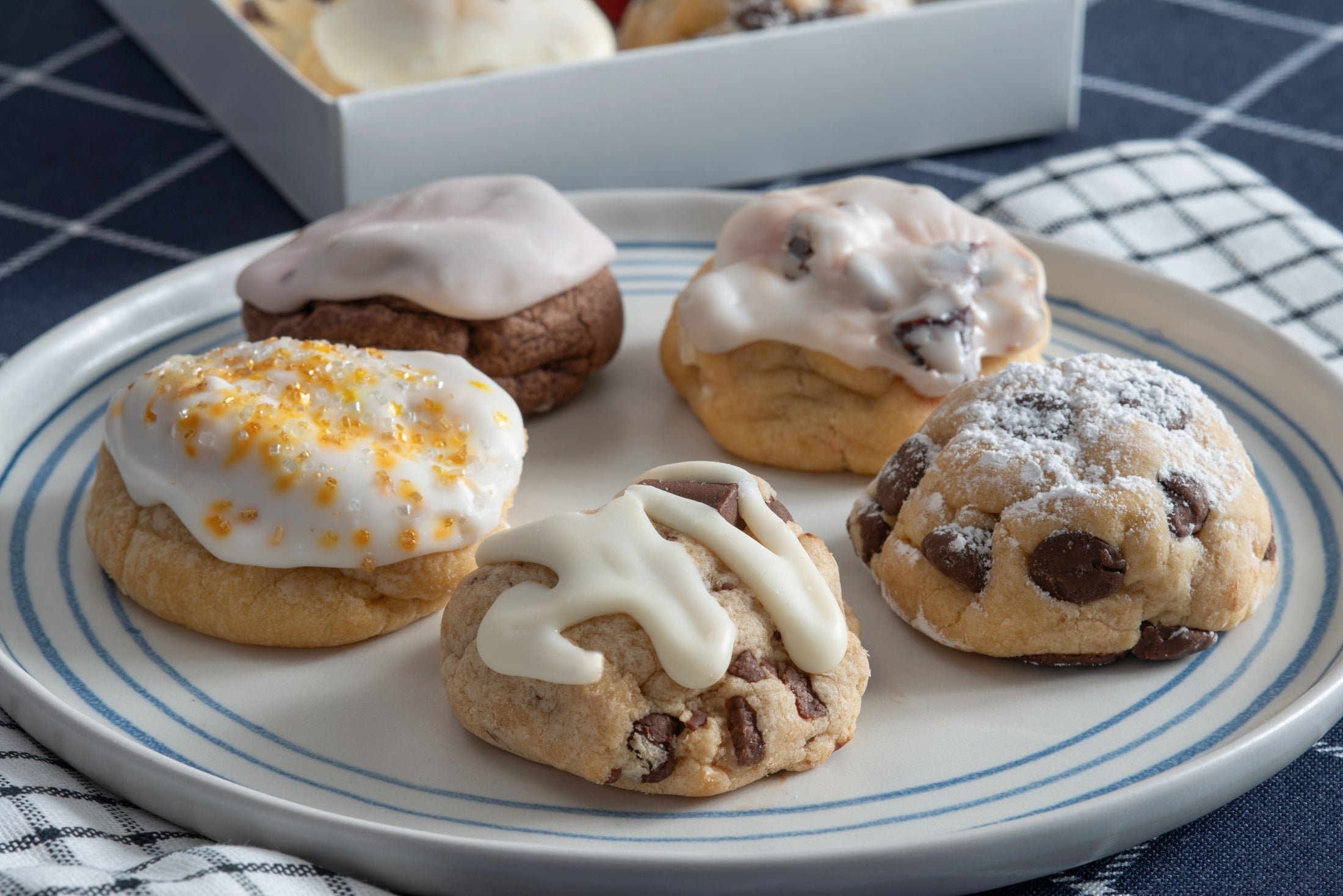 A platter of our Iced Sugar Gems, Caramel Rock, Chocolate Chip, Amaretto, and Iced Brownie Grenade.