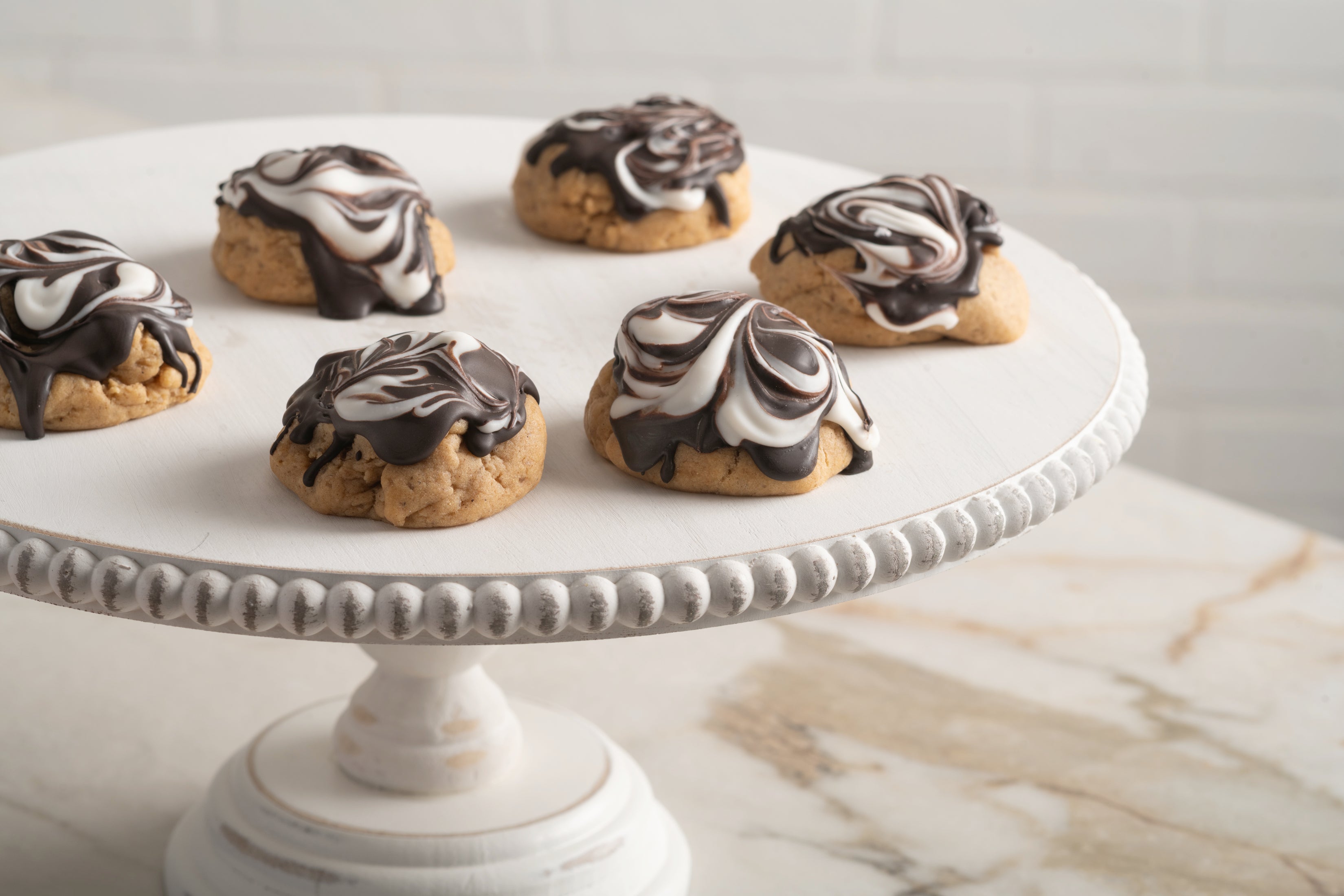 Our Poetry cookie: chai dough, dark chocolate, and vanilla icing.
