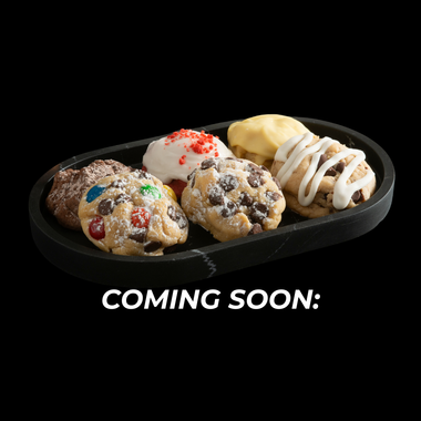 Holiday Candied Chocolate Chip, Iced Brownie Raspberry, Peanut Butter Chocolate Delight, and Sugared Gingerbread.