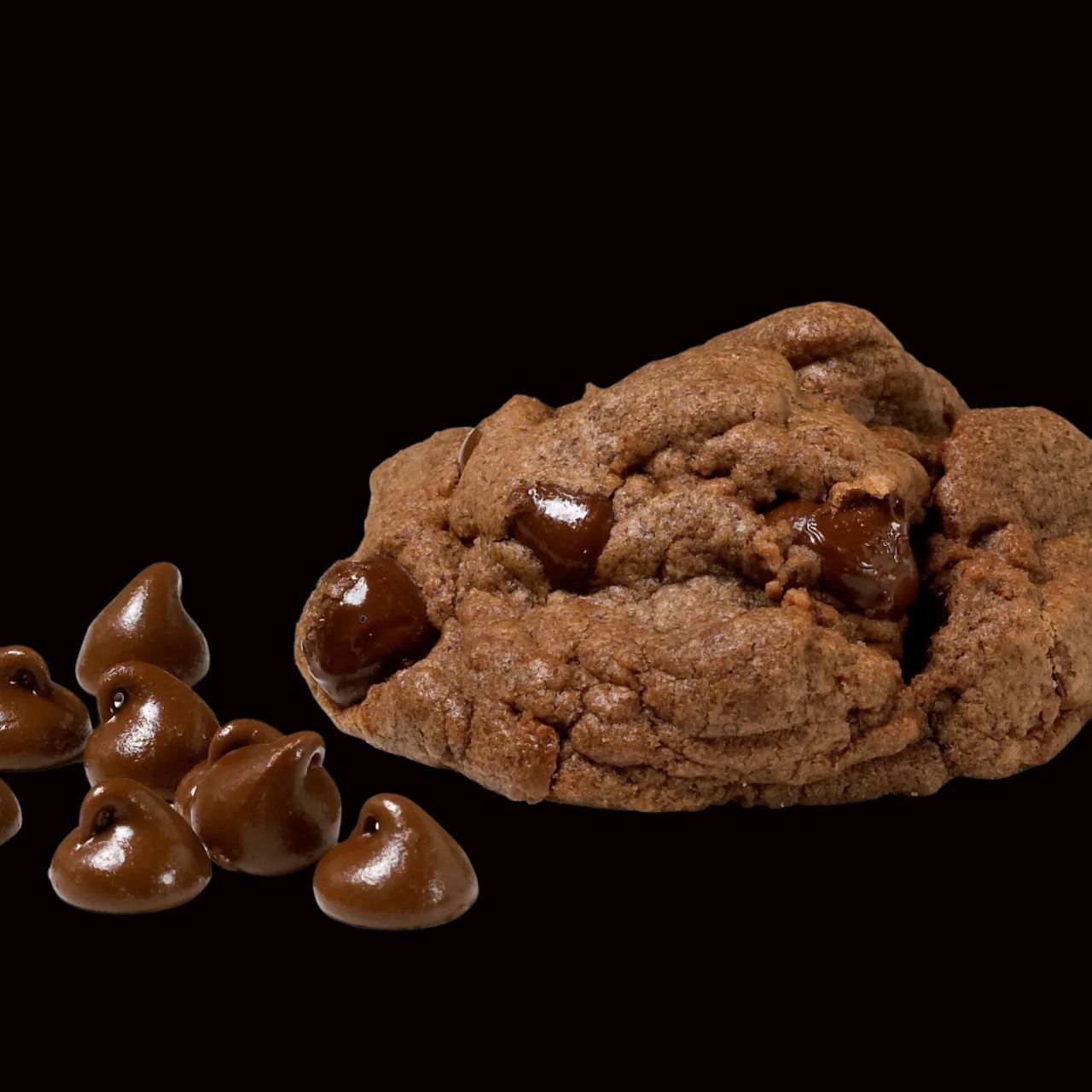 Our gourmet, handcrafted Chocolate Brownie Grenade cookie, with chocolate chips, brownie flavor, and powdered sugar on top.